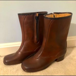 Size 7 brown waterproof/ fur lined winter. New and never worn